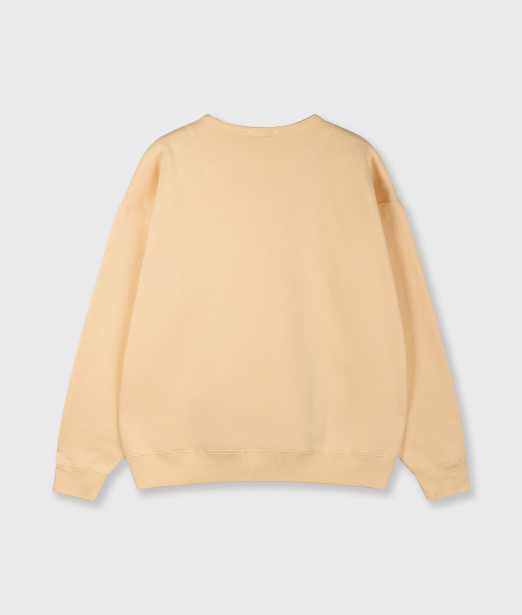statement sweater logo | pastel mango